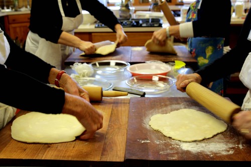 Ladies in black rollin the dough